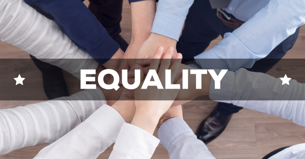 diverse hands clasped the word equality