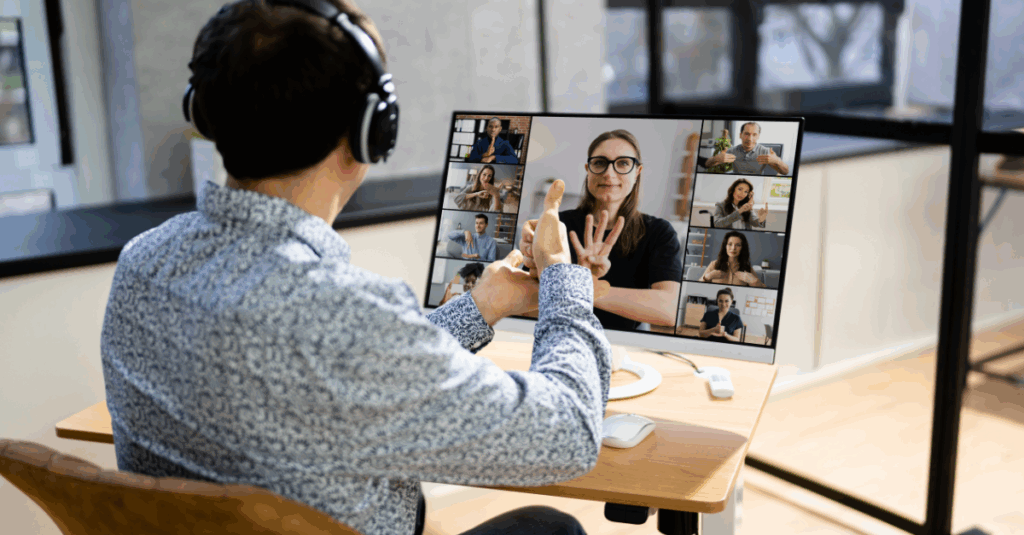 man speaking sign language on video call